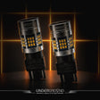 Two Underground Lighting 2020–2023 Ford F-150 LED Front Turn Signal Replacement Bulbs on a dark background with glowing lines.