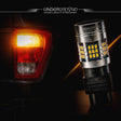 Car tail light and LED 2021–2023 Ford F-150 STX LED Rear Turn Signal Replacement Bulbs for 3X Rear Visibility| 4257 Amber bulb with 'Underground Lighting' branding on a dark background.