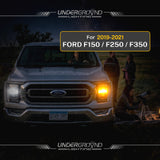 Ford truck with glowing headlights at night, featuring Underground Lighting for 2019-2021 Ford F150/F250/F350.